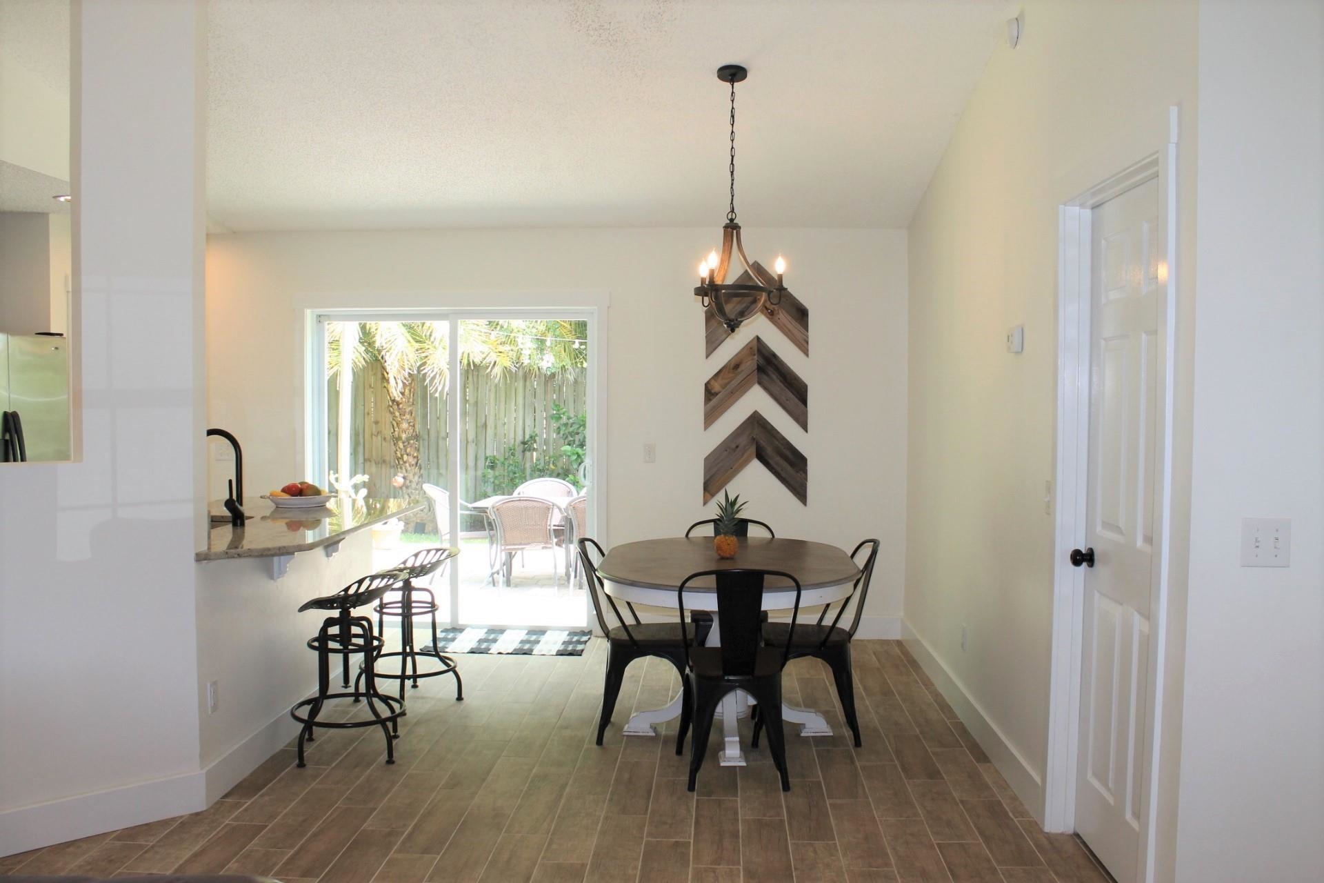 215 Yale Road St. Augustine, FL 32086 - Photo 9 of 35 a view of a room with furniture window and wooden floor