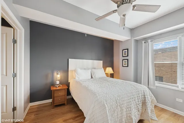 a bed room with a bed and a window