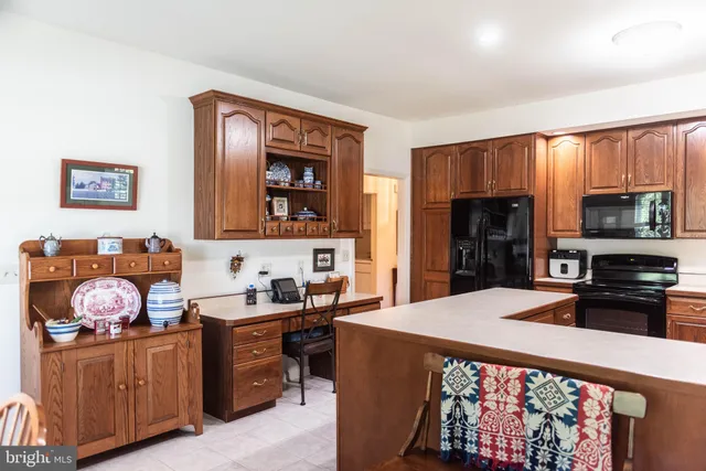 a bed room with a bed and a television