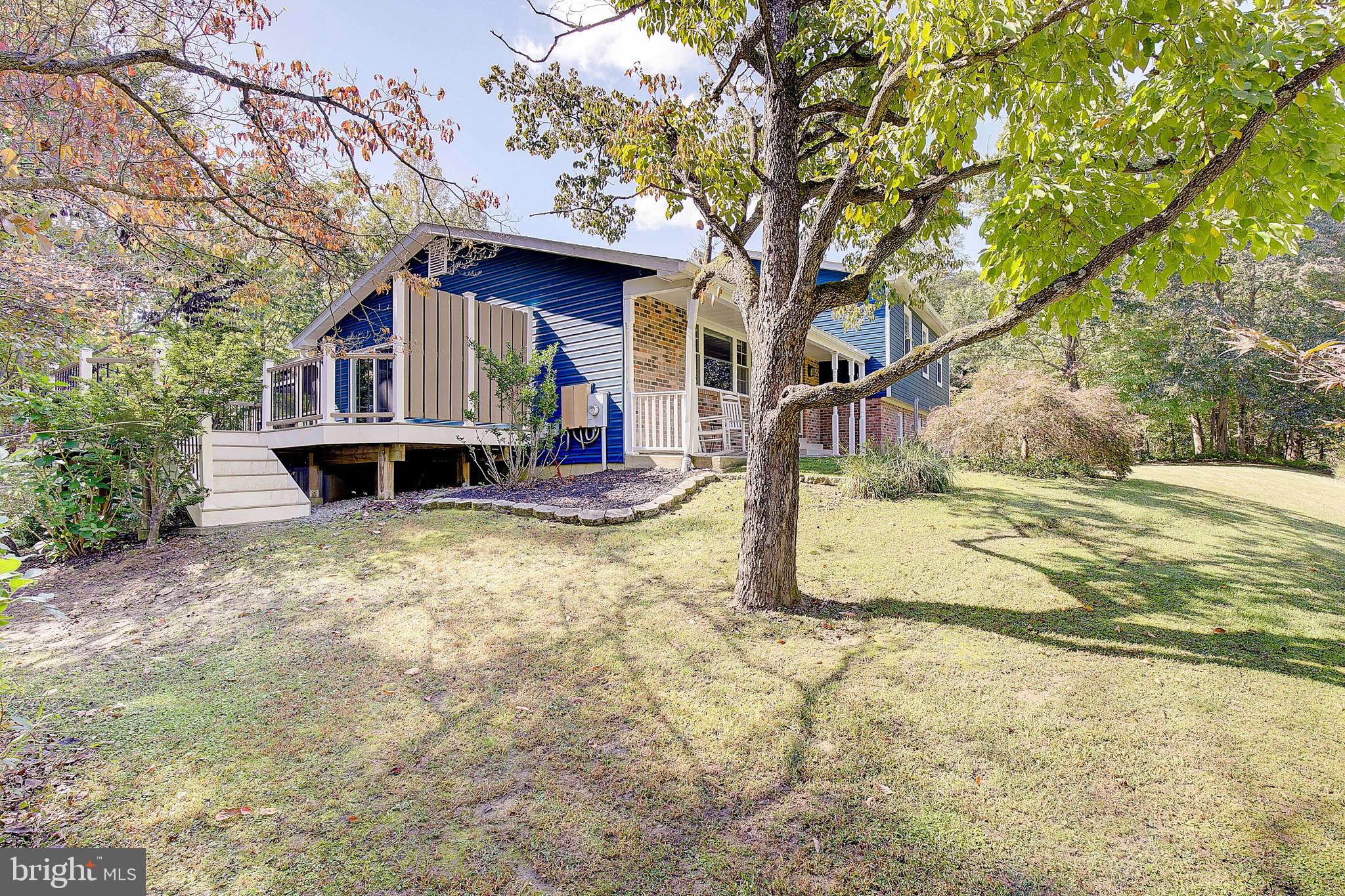 1225 Lake Ridge Drive Sunderland, MD 20689 - Photo 22 of 57 a view of a house with backyard and trees