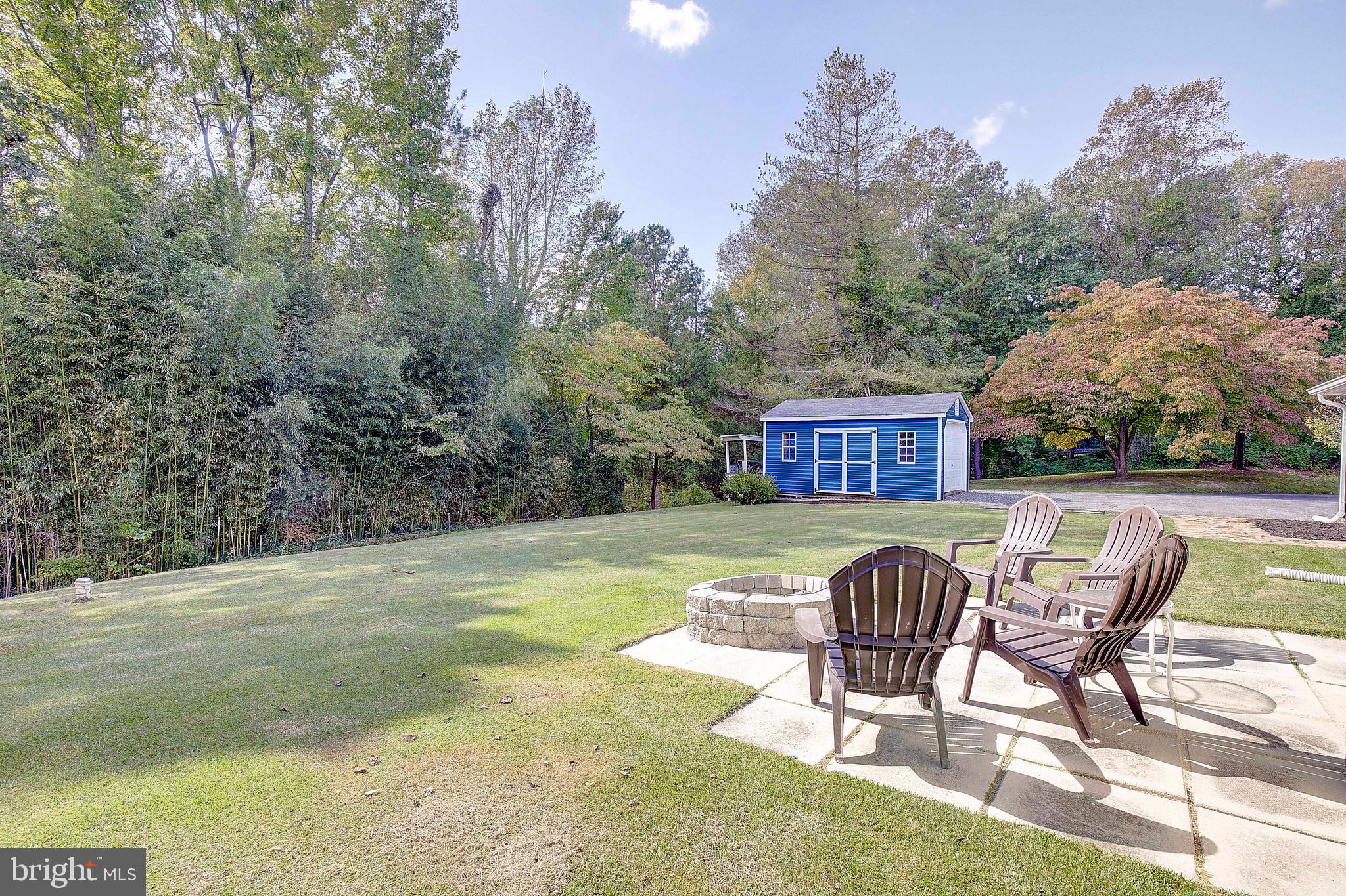 1225 Lake Ridge Drive Sunderland, MD 20689 - Photo 33 of 57 a view of a chairs and table in patio