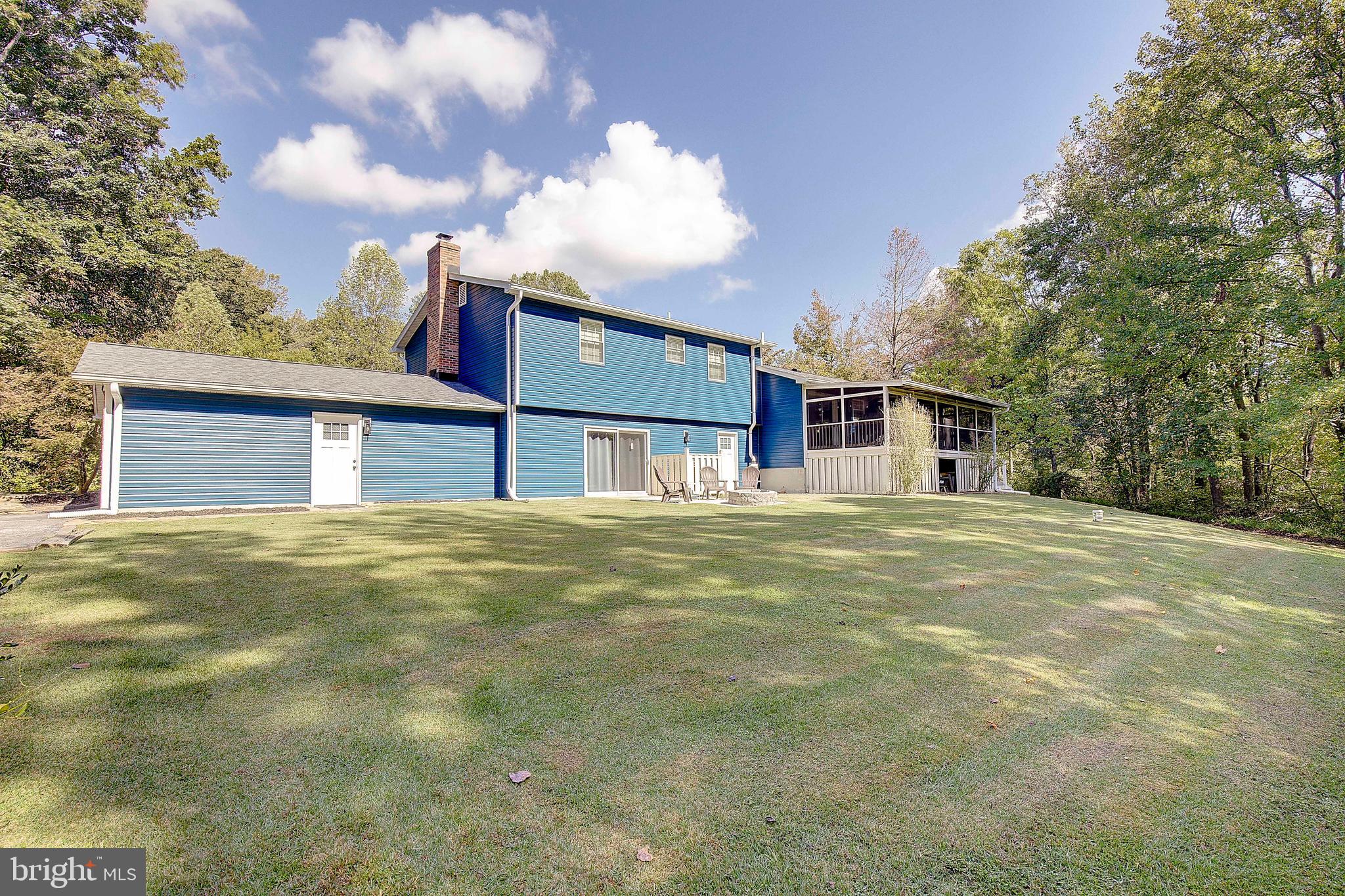 1225 Lake Ridge Drive Sunderland, MD 20689 - Photo 35 of 57 a view of a house with a backyard
