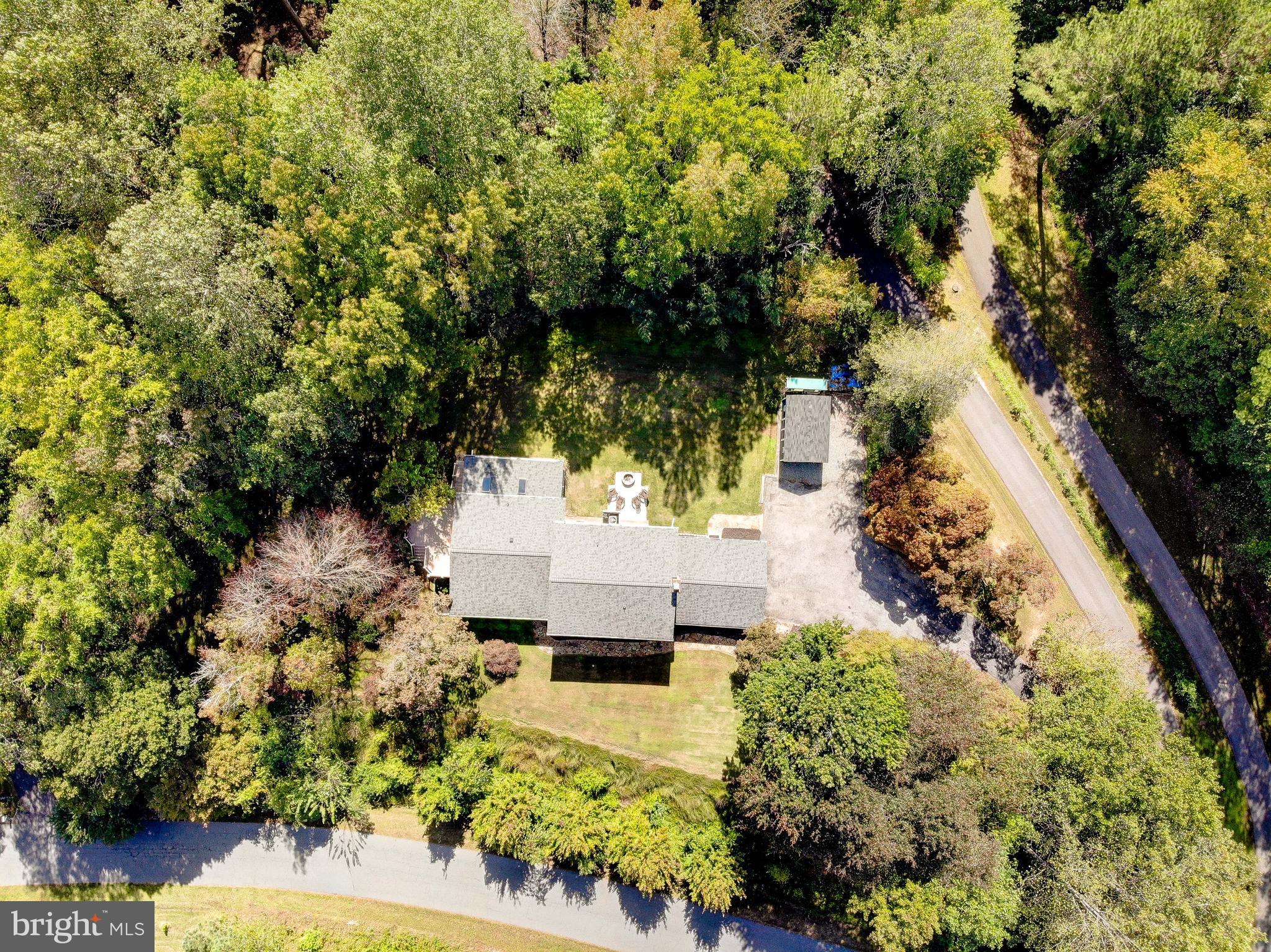 1225 Lake Ridge Drive Sunderland, MD 20689 - Photo 44 of 57 an aerial view of a house with a yard and garden