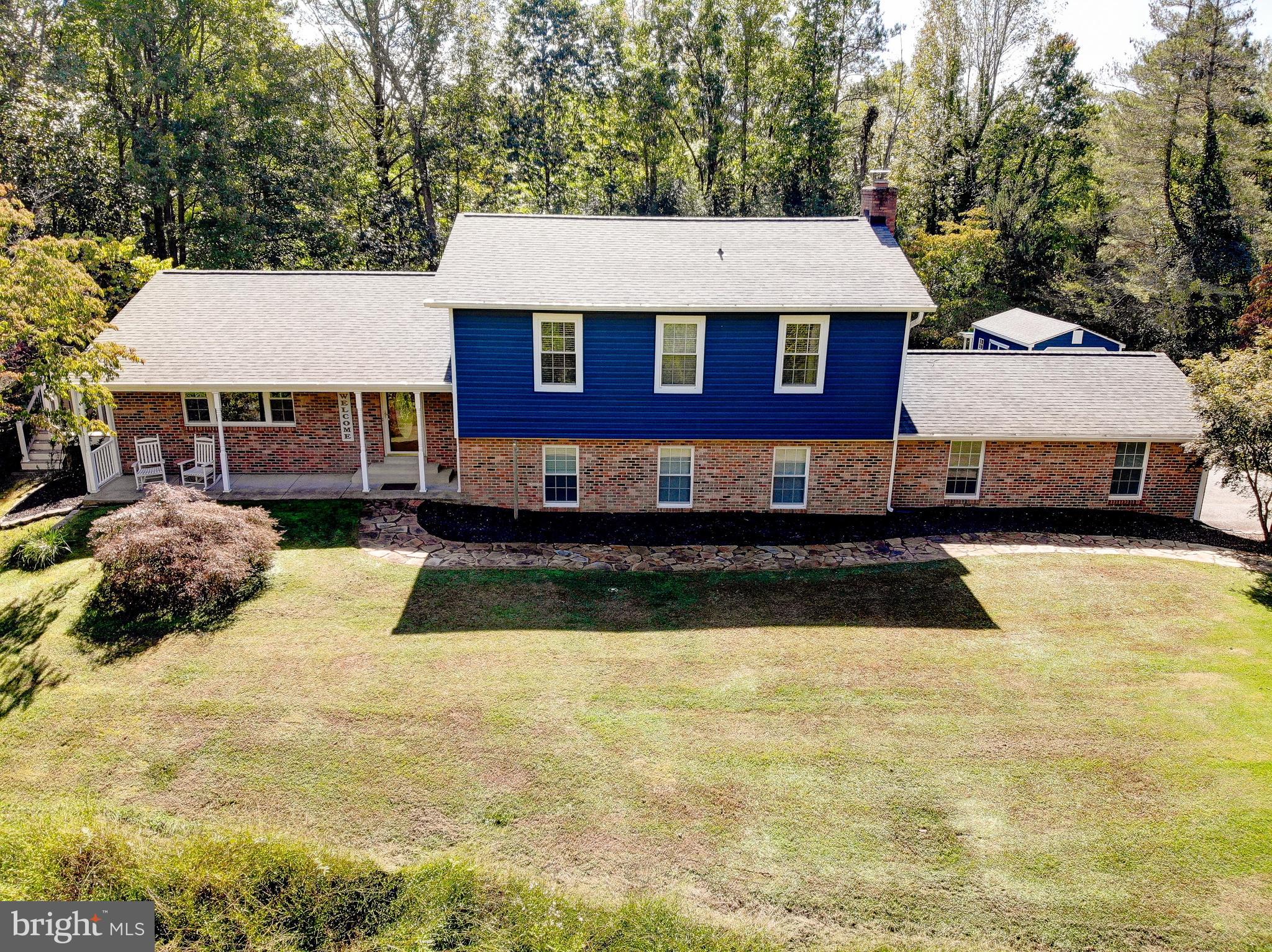 1225 Lake Ridge Drive Sunderland, MD 20689 - Photo 48 of 57 a view of a house with a swimming pool
