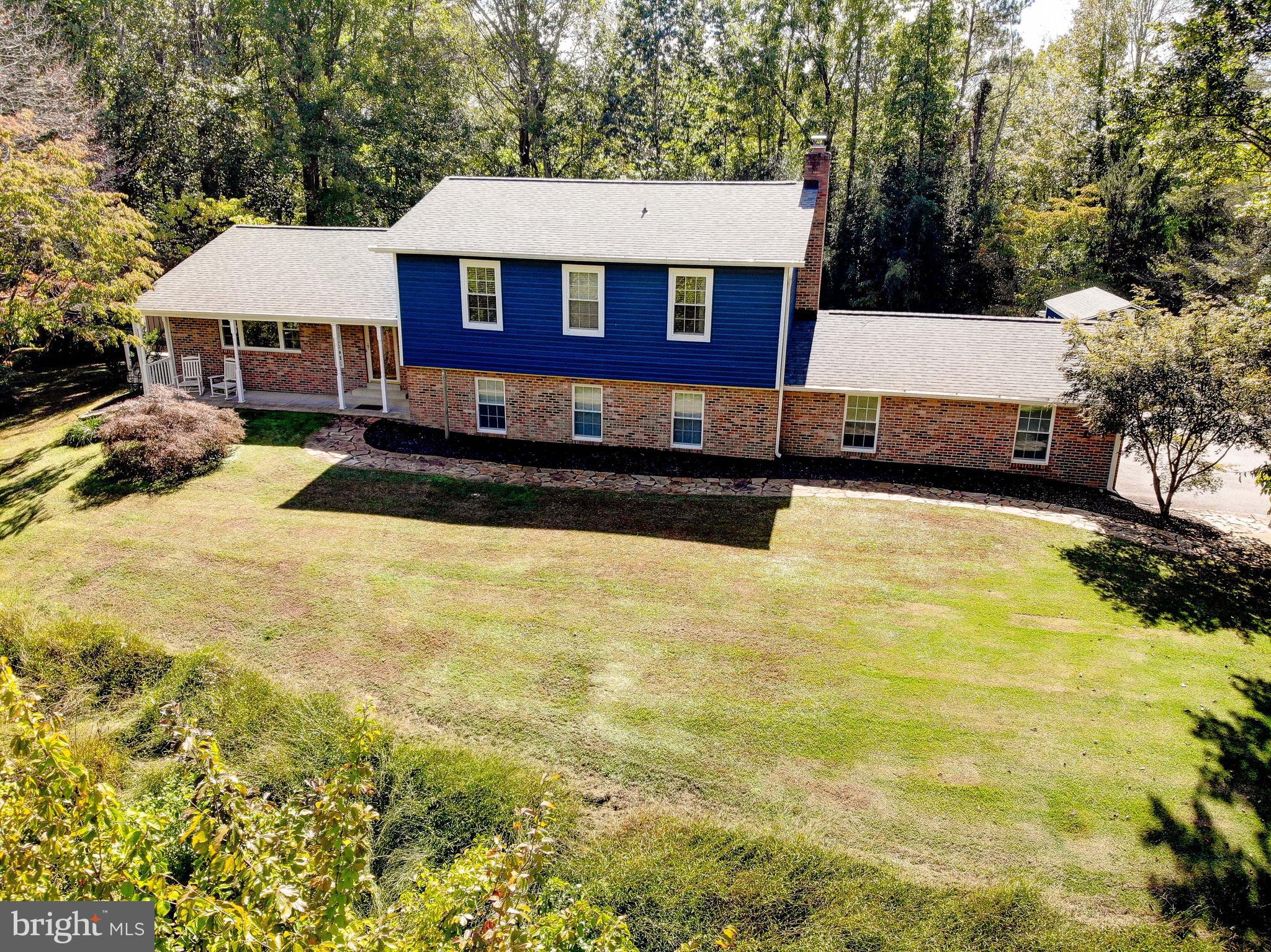 1225 Lake Ridge Drive Sunderland, MD 20689 - Photo 50 of 57 a view of a house with pool and sitting area