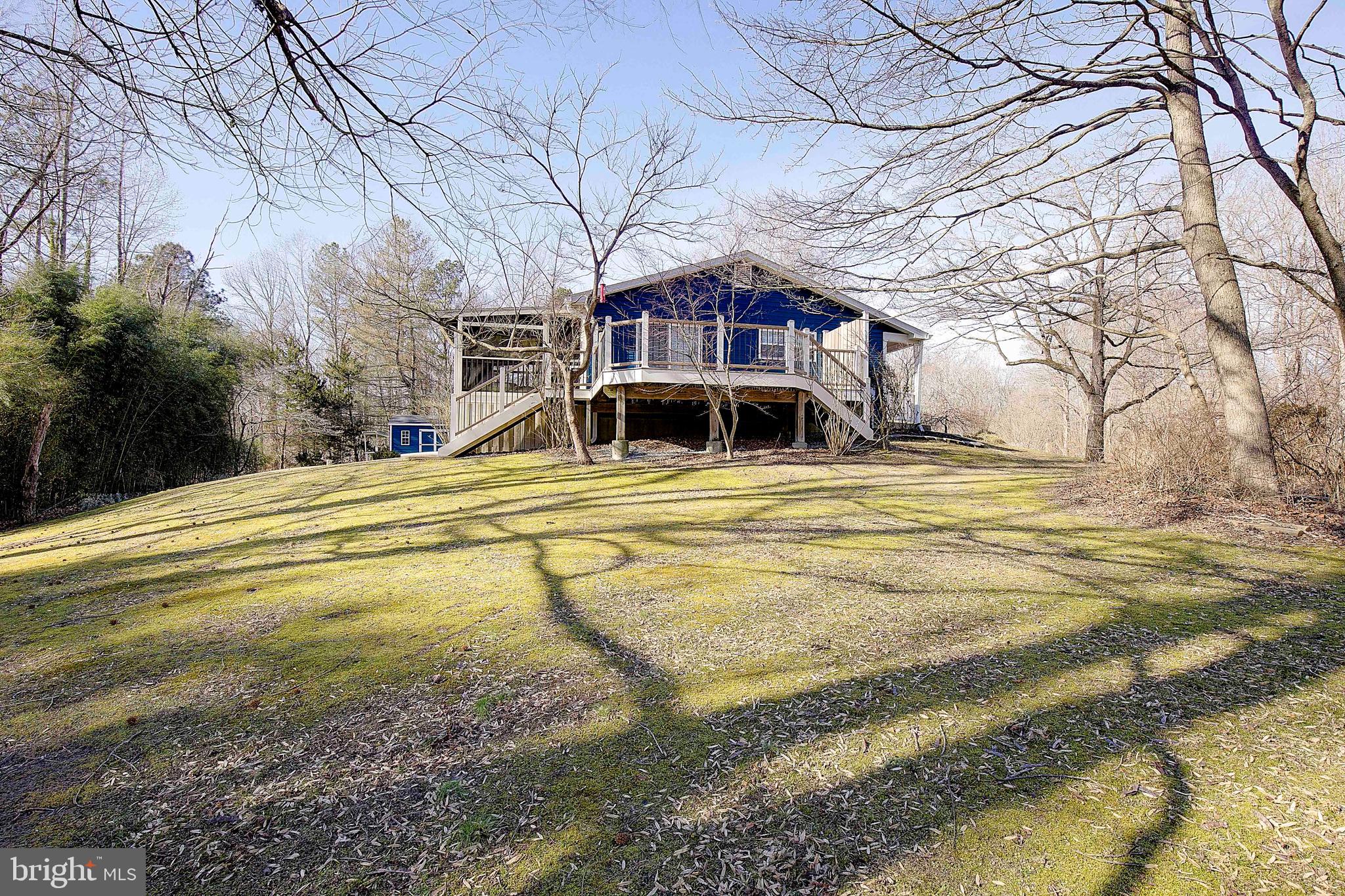 1225 Lake Ridge Drive Sunderland, MD 20689 - Photo 6 of 57 a view of a house with a yard