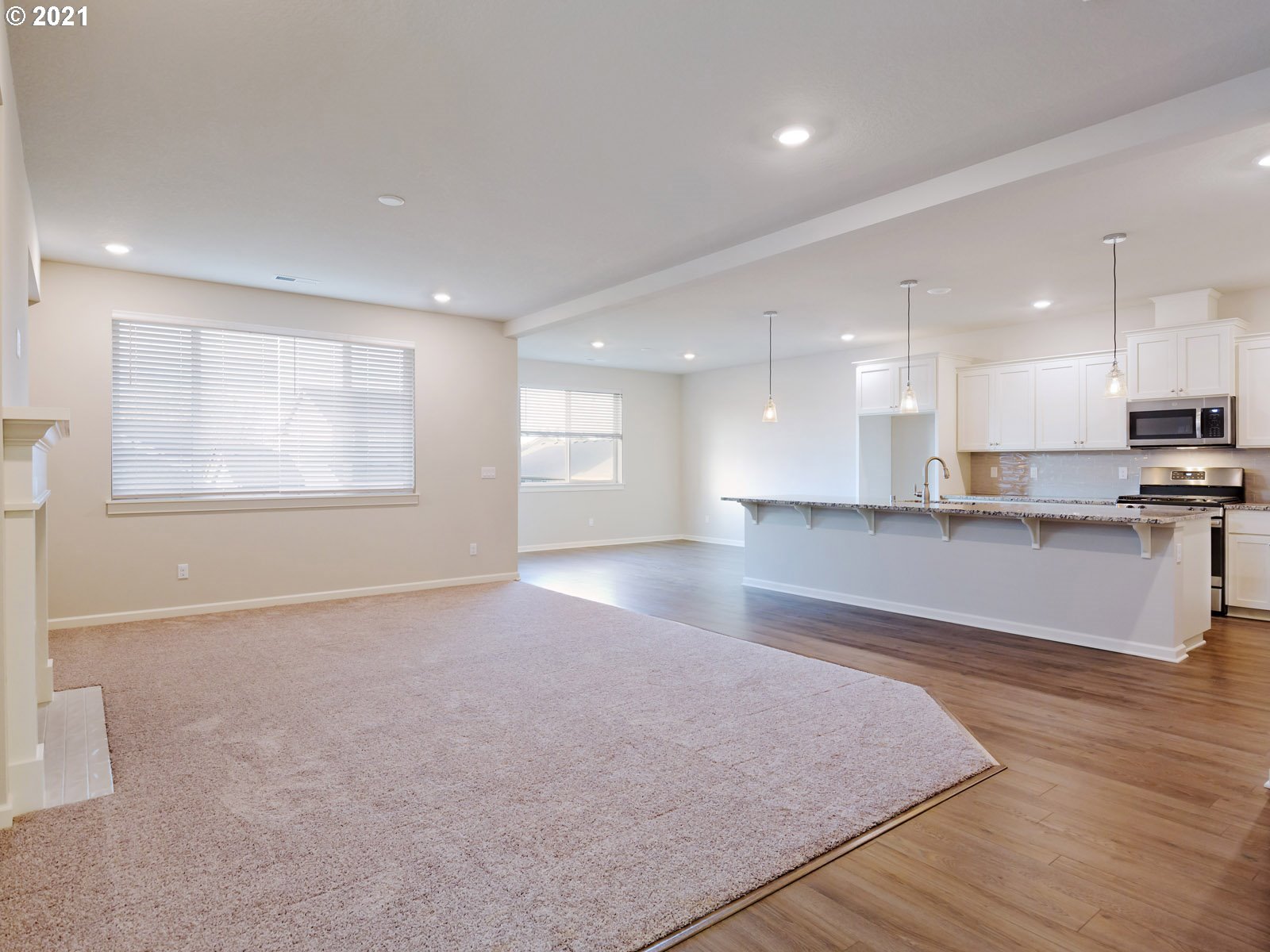 3733 South 42nd Place Ridgefield, WA 98642 - Photo 10 of 23 a view of an empty room with kitchen appliances and a window