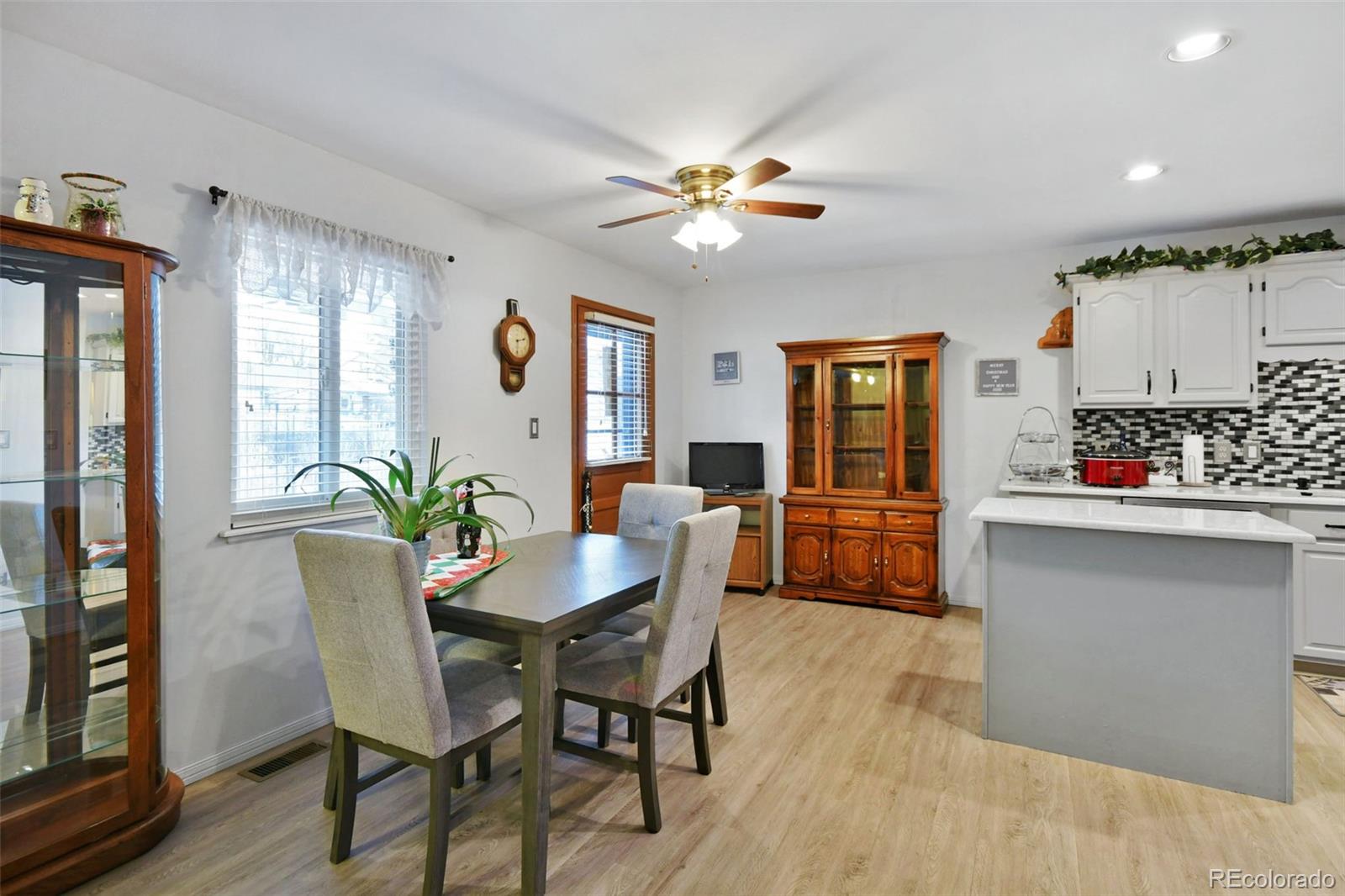 1360 Yank Street Golden, CO 80401 - Photo 14 of 26 a dining room with furniture and window