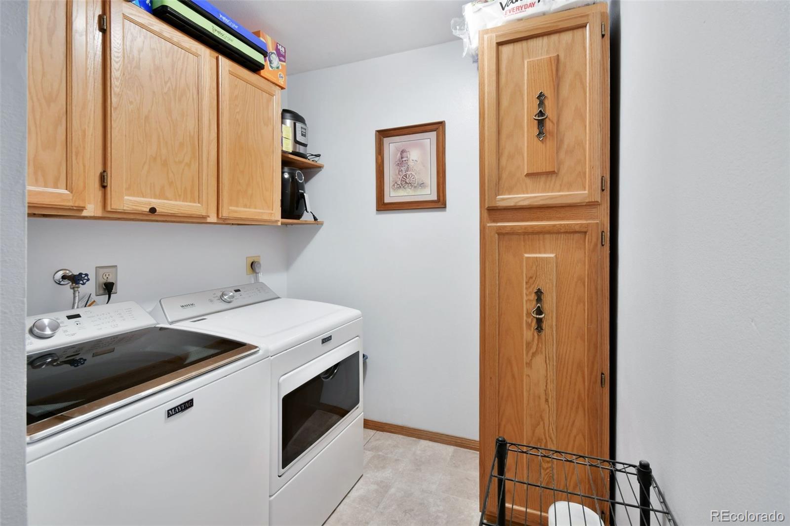 1360 Yank Street Golden, CO 80401 - Photo 15 of 26 a utility room with dryer and washer