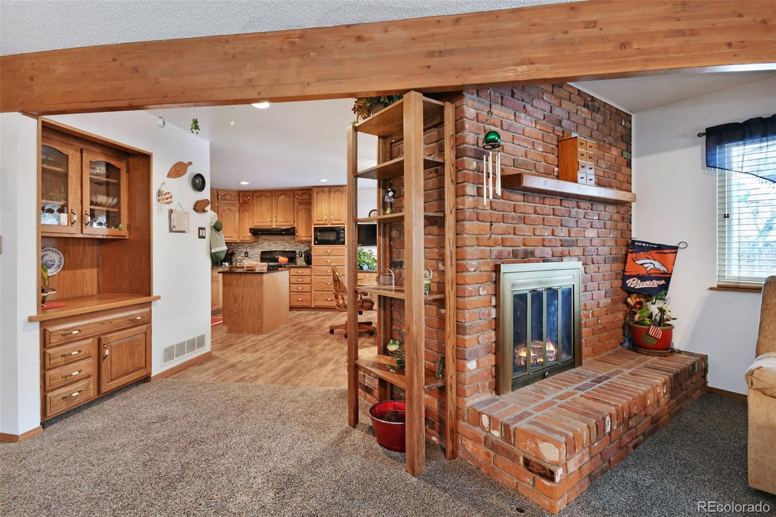 1360 Yank Street Golden, CO 80401 - Photo 3 of 26 a living room with furniture and a flat screen tv