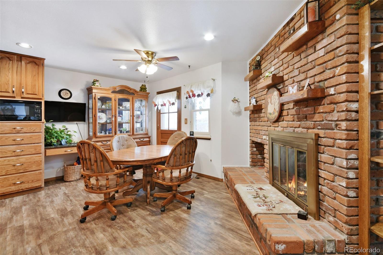1360 Yank Street Golden, CO 80401 - Photo 4 of 26 a view of a livingroom with furniture and a fireplace