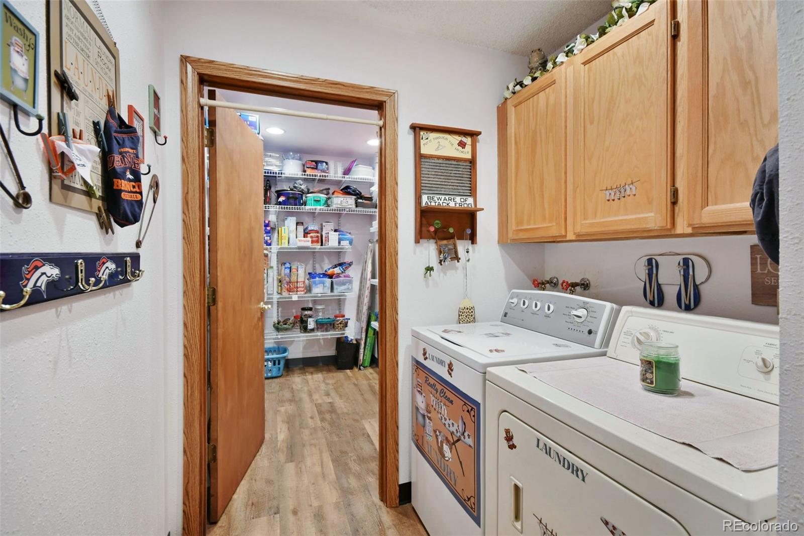 1360 Yank Street Golden, CO 80401 - Photo 7 of 26 a utility room with dryer and washer