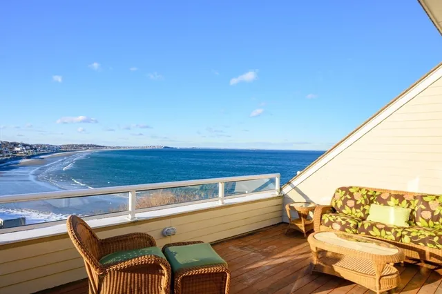 a view of a chairs and table in a patio
