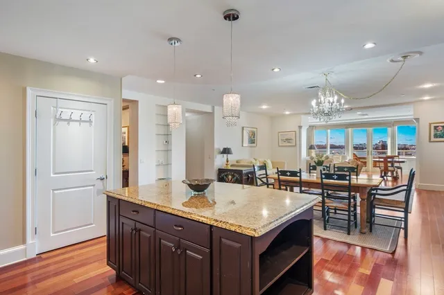 a large kitchen with lots of counter space and a sink