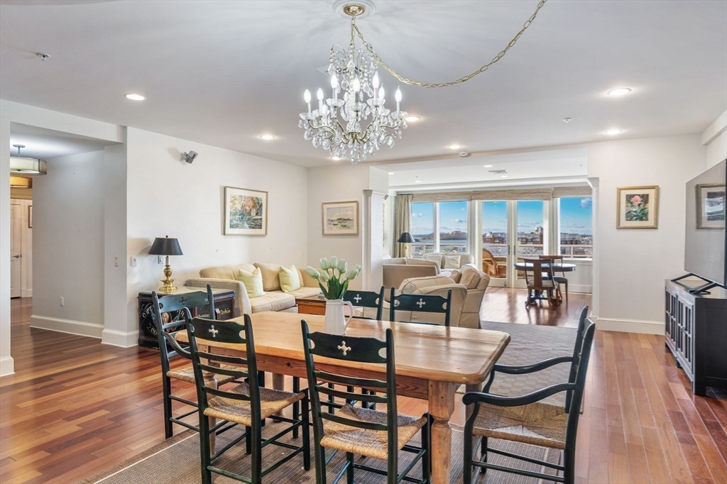 1 Longbeach Avenue, Unit 202 Hull, MA 02045 - Photo 10 of 40 a view of a dining room with furniture window and wooden floor
