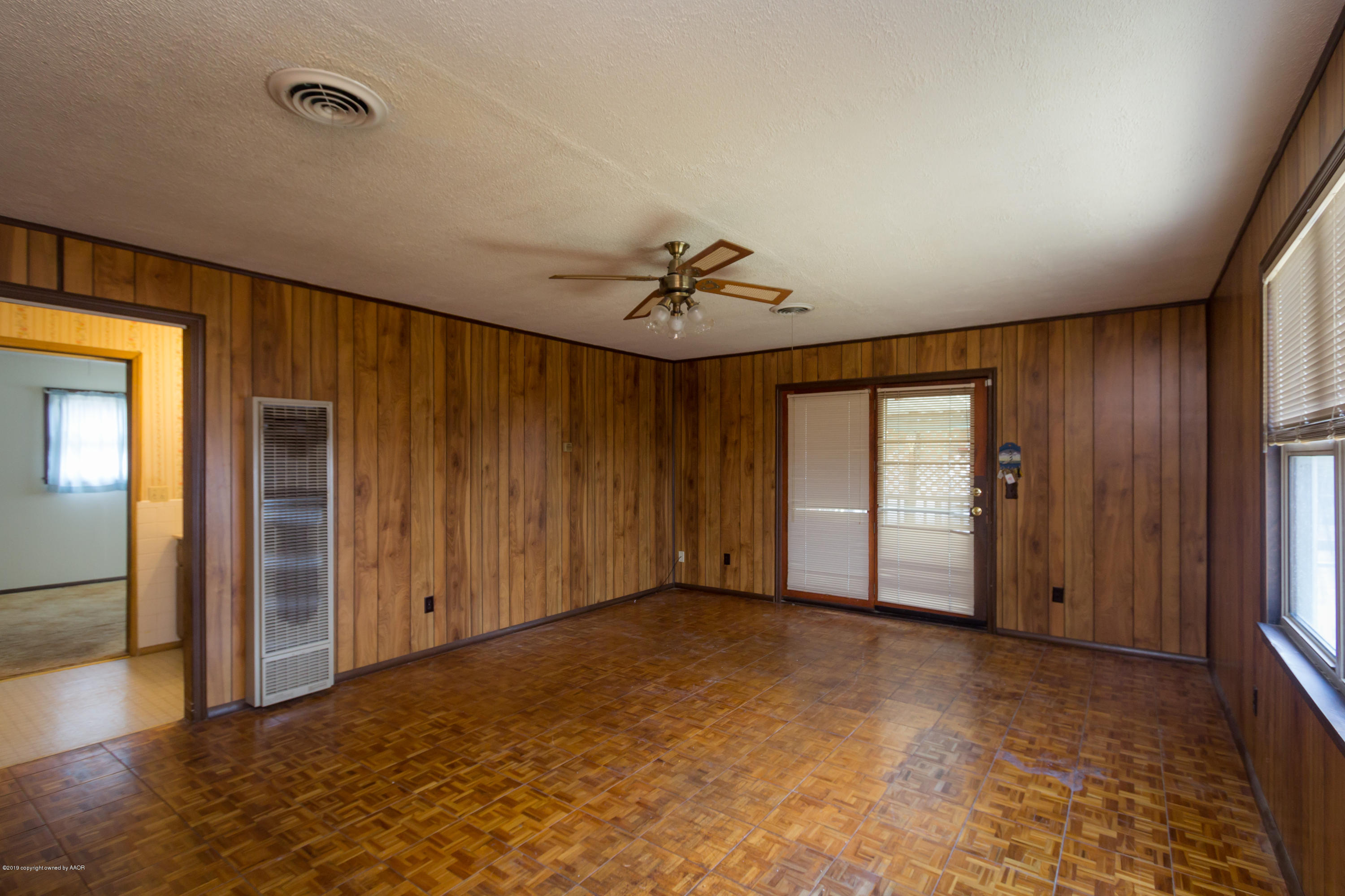 4606 Bowie Street Amarillo, TX 79110 - Photo 20 of 42 an empty room with closet and windows