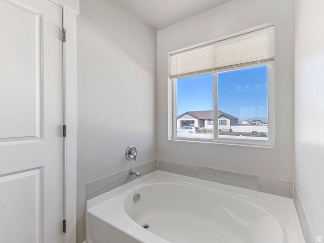 573 South Maxwell Drive Grantsville, UT 84029 - Photo 14 of 25 Full bathroom with a bath