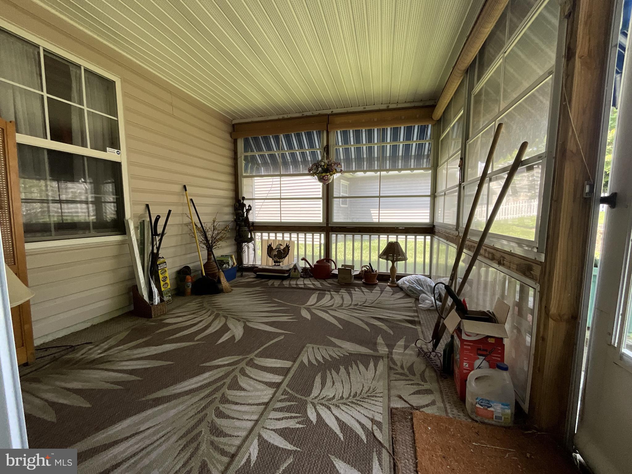 7324 Summerwind Circle Laurel, MD 20707 - Photo 13 of 20 a view of a porch with furniture