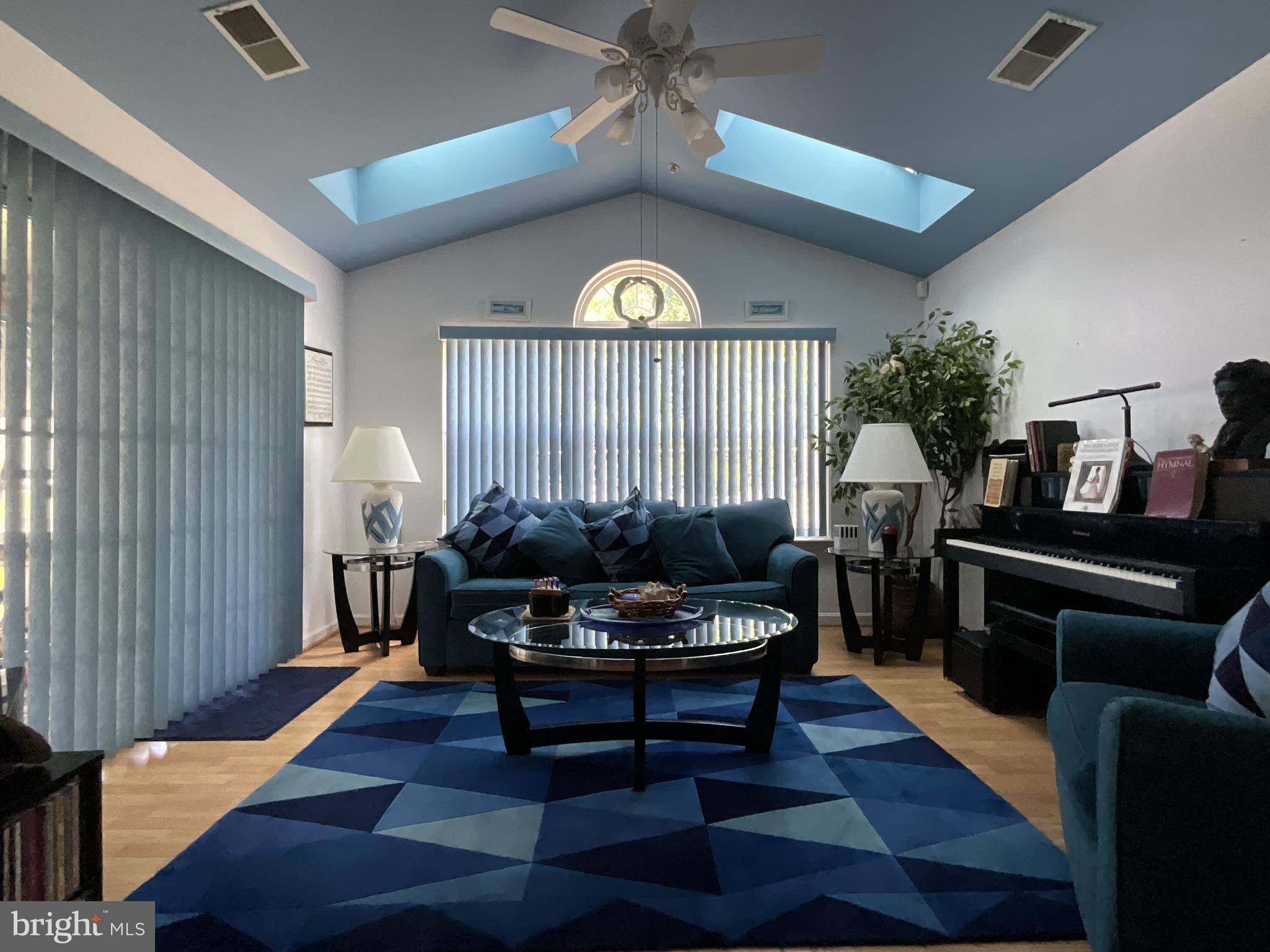 7324 Summerwind Circle Laurel, MD 20707 - Photo 5 of 20 a living room with furniture and wooden floor