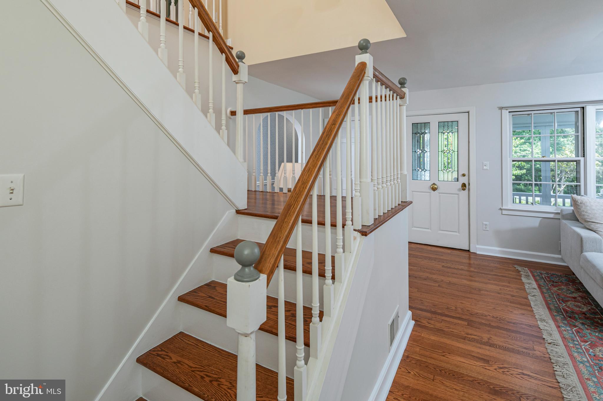224 King George Road Pennington, NJ 08534 - Photo 30 of 58 a view of staircase with wooden floor and white walls