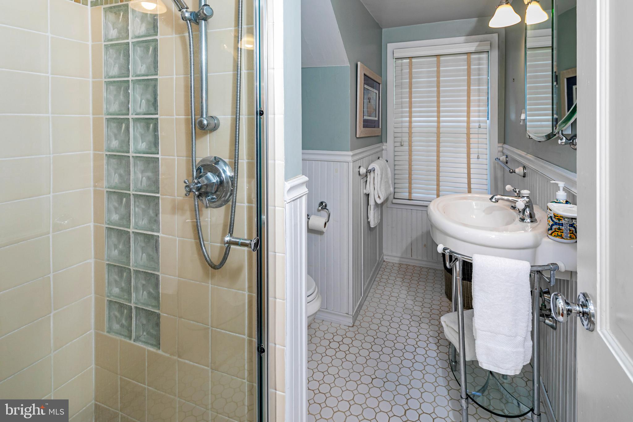 224 King George Road Pennington, NJ 08534 - Photo 38 of 58 a bathroom with a sink toilet and shower