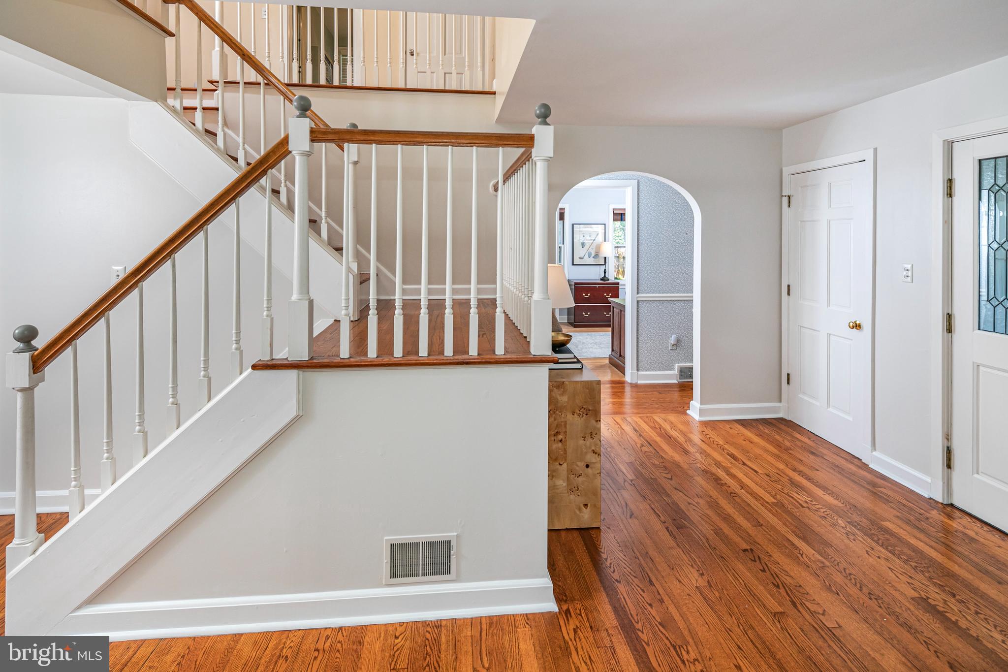 224 King George Road Pennington, NJ 08534 - Photo 7 of 58 a view of staircase with wooden floor and white walls