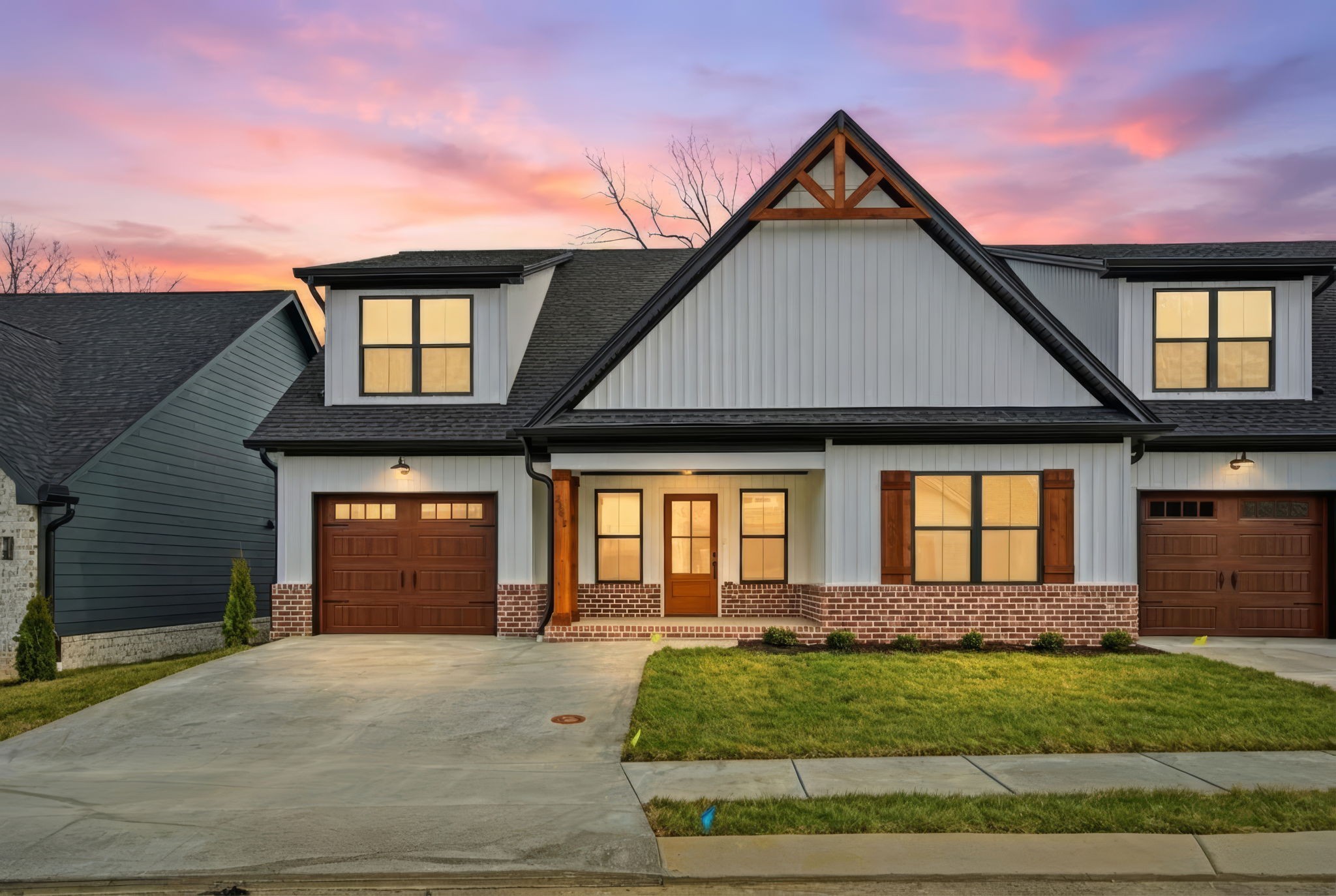 2145 Rylee Way, Unit 5 Greenbrier, TN 37073 - Photo 5 of 32 a front view of a house with a yard and garage