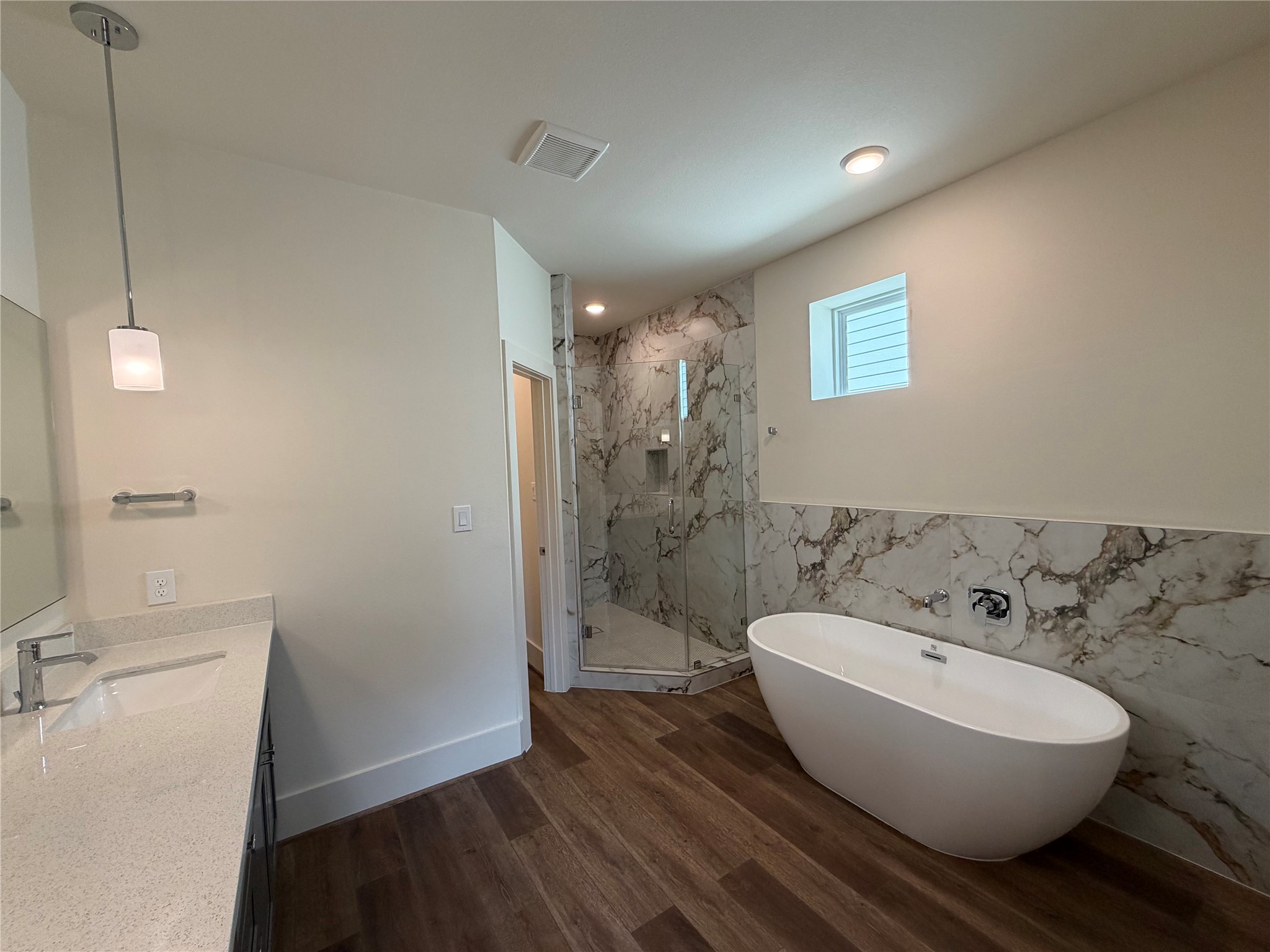 879 Rachel Street, Unit E Houston, TX 77091 - Photo 27 of 34 a bathroom with a sink and mirror