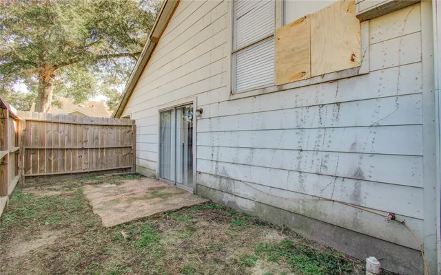 a view of a house with a yard and garage