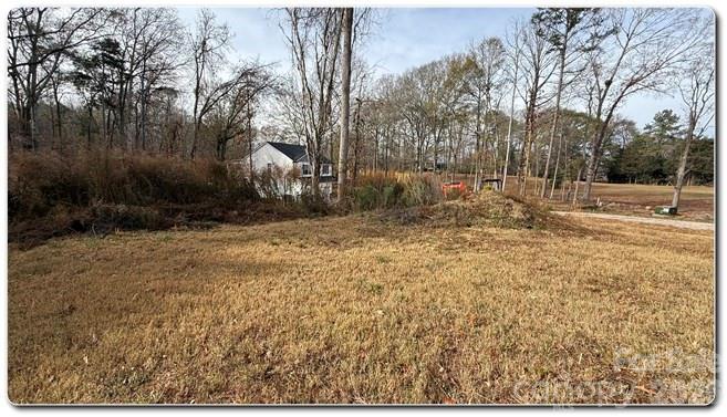 9472 Caddell Road Fort Mill, SC 29707 - Photo 17 of 17 a backyard of a house with lots of green space