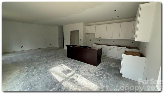 9472 Caddell Road Fort Mill, SC 29707 - Photo 3 of 17 a view of workspace with wooden floor