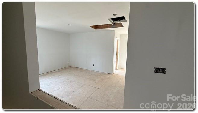 9472 Caddell Road Fort Mill, SC 29707 - Photo 4 of 17 a view of a room with rack on the wall