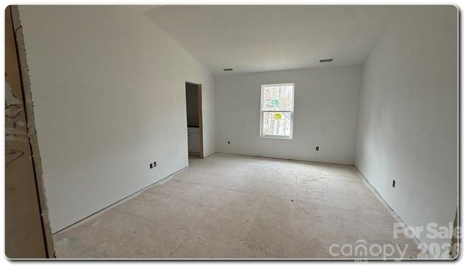 9472 Caddell Road Fort Mill, SC 29707 - Photo 5 of 17 a view of empty room with windows