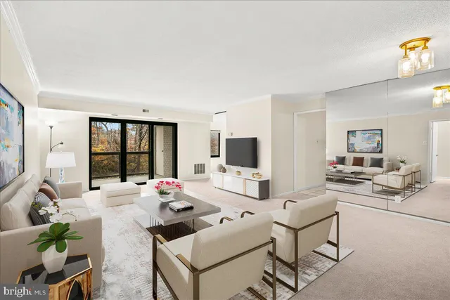 a living room with furniture a flat screen tv and a large window