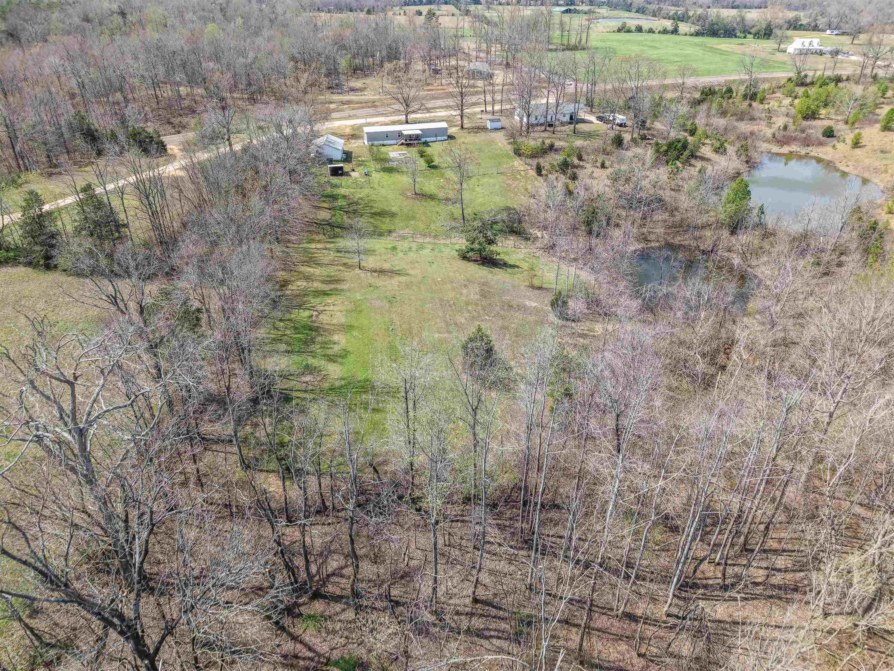 7010 22nd Highway Adamsville, TN 38310 - Photo 31 of 33 Overview of rural landscape with a large body of water