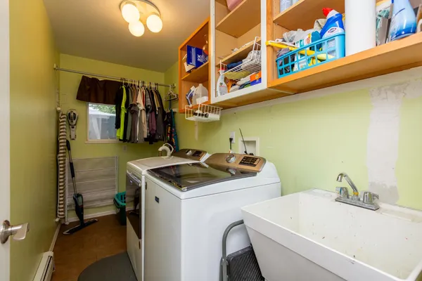 a utility room with dryer and washer
