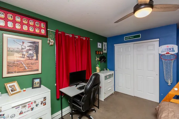 a workspace with furniture and window