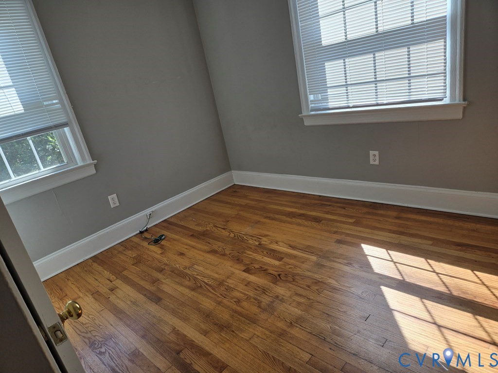 1546 Cumberland Road Farmville, VA 23901 - Photo 2 of 8 a view of a room with wooden floor and windows