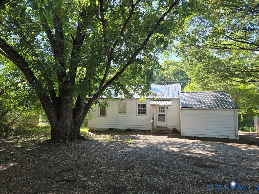 1546 Cumberland Road Farmville, VA 23901 - Photo 7 of 8 a view of house with backyard space and garden