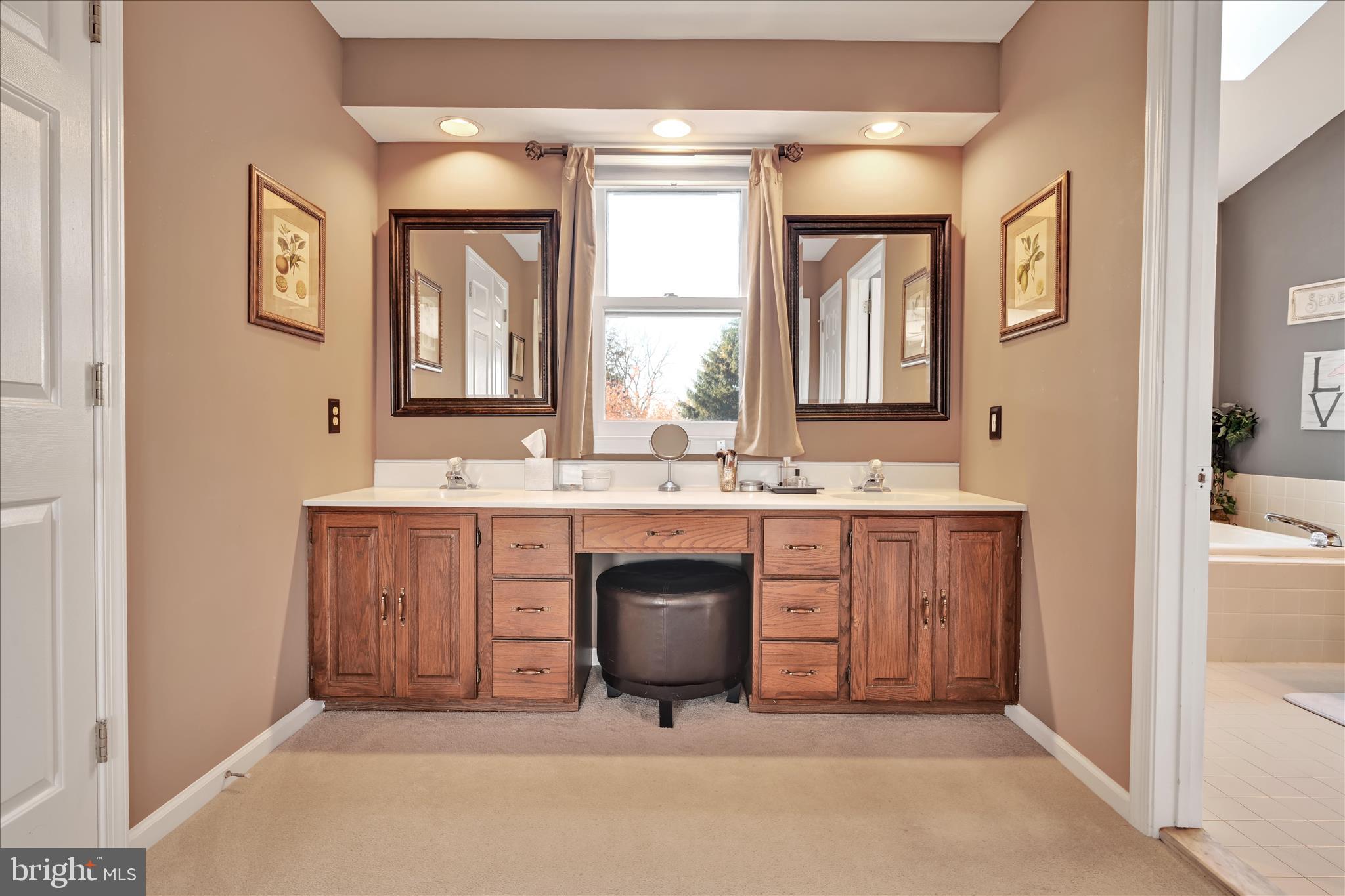 206 Marie Road West Chester, PA 19380 - Photo 24 of 51 a bathroom with a sink double vanity and a mirror