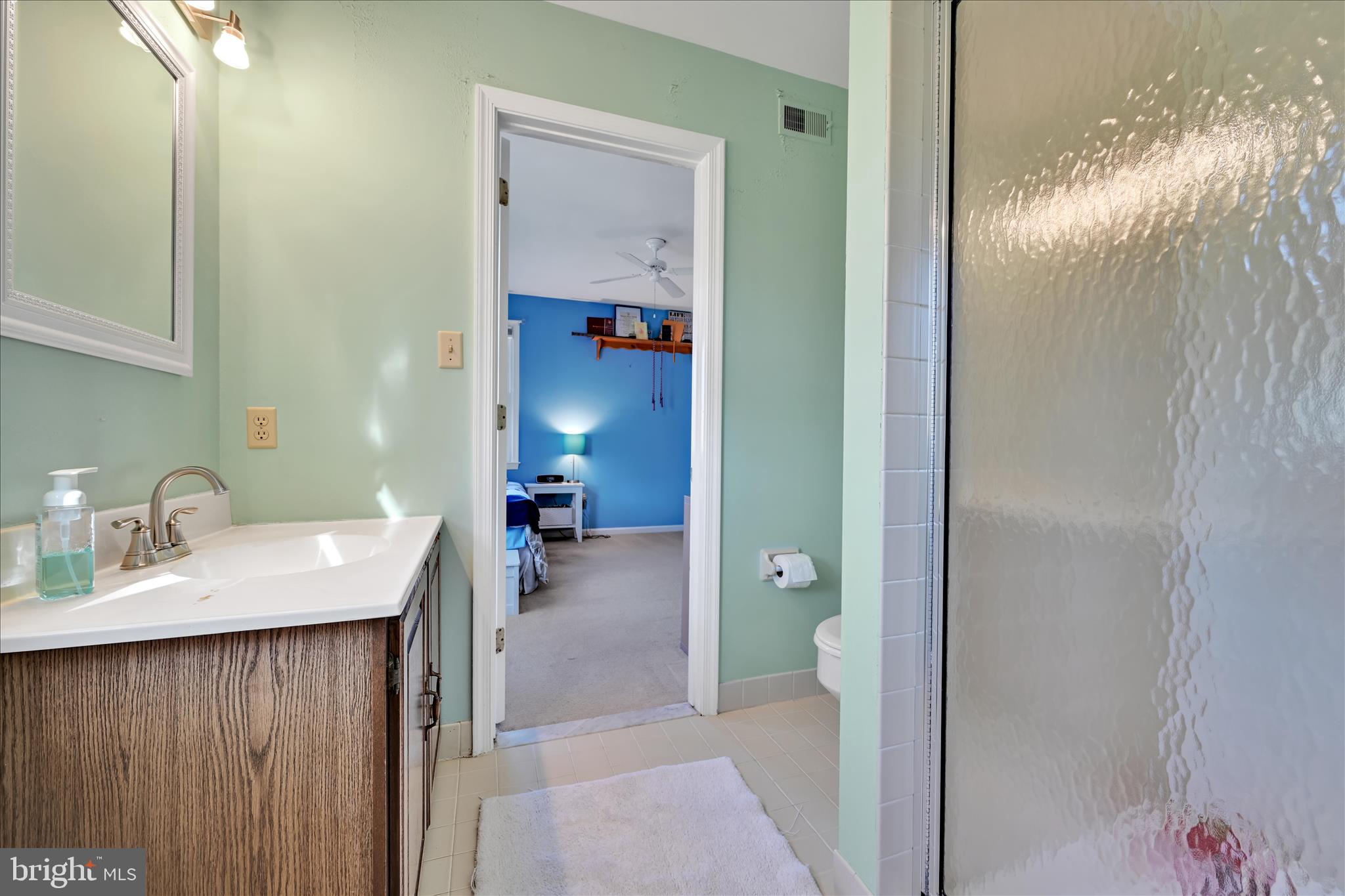 206 Marie Road West Chester, PA 19380 - Photo 29 of 51 a en suite bathroom with a granite countertop sink and a mirror