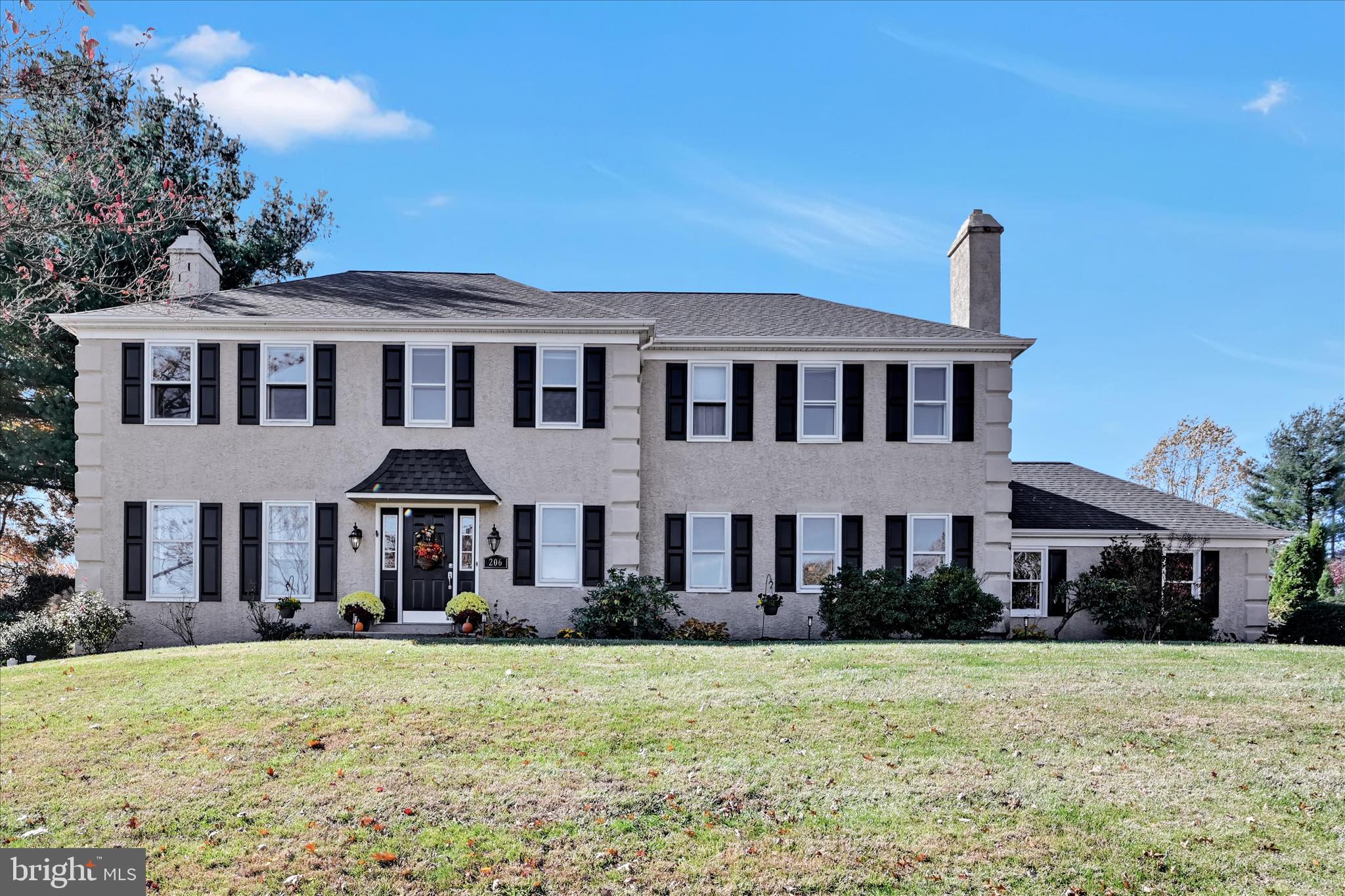 206 Marie Road West Chester, PA 19380 - Photo 3 of 51 a front view of a house with a yard