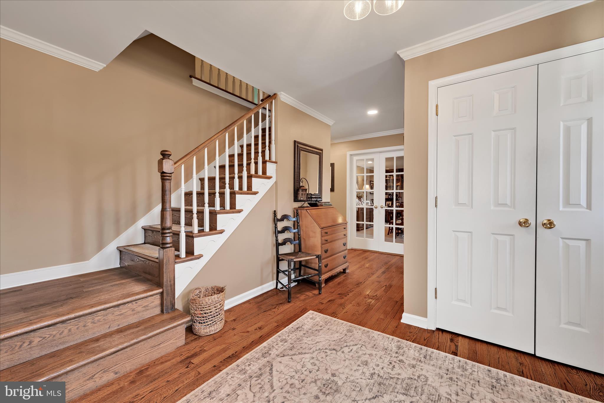 206 Marie Road West Chester, PA 19380 - Photo 7 of 51 a view of a hallway with wooden floor and staircase