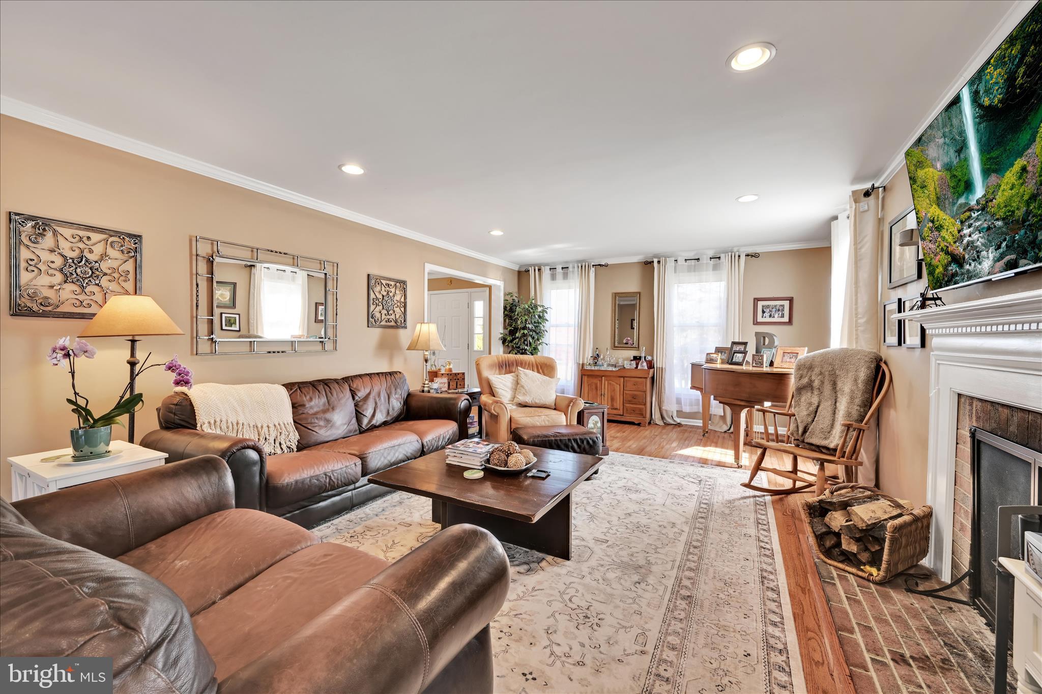 206 Marie Road West Chester, PA 19380 - Photo 10 of 51 a living room with furniture and a flat screen tv