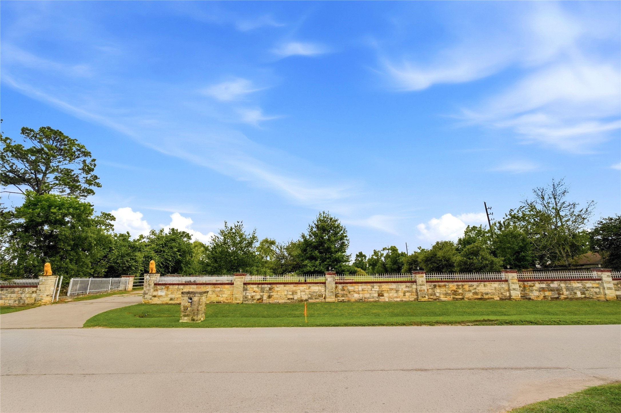 11741 Ezekiel Road Tomball, TX 77375 - Photo 2 of 30 a view of green field with trees in the background