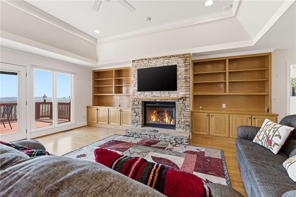 1015 Eagle Ridge Road Dawsonville, GA 30534 - Photo 13 of 64 a bedroom with a bed and a television