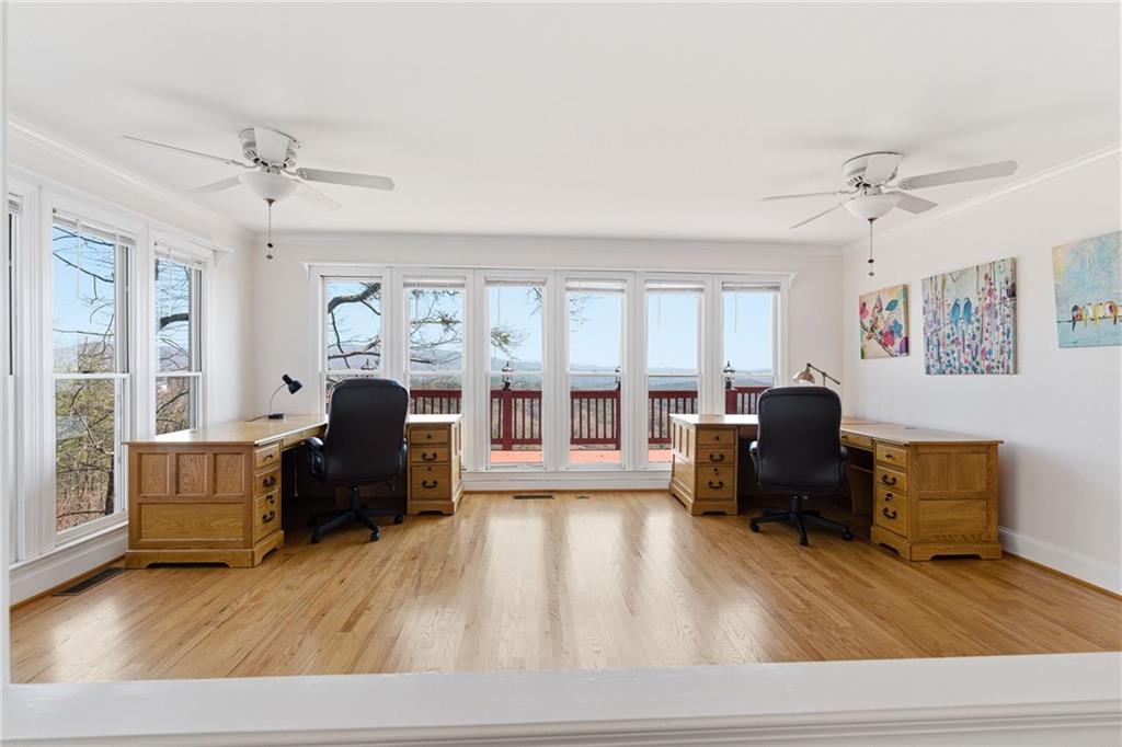 1015 Eagle Ridge Road Dawsonville, GA 30534 - Photo 18 of 64 a living room with furniture and wooden floor