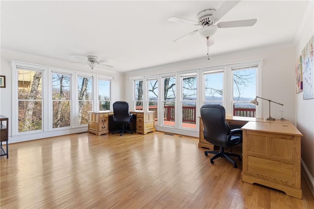 1015 Eagle Ridge Road Dawsonville, GA 30534 - Photo 19 of 64 a view of a livingroom with workspace and a window