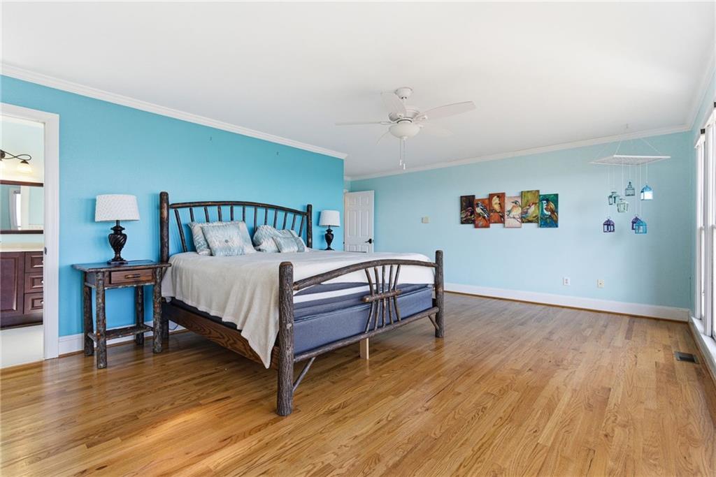 1015 Eagle Ridge Road Dawsonville, GA 30534 - Photo 24 of 64 a bed room with a bed and a table