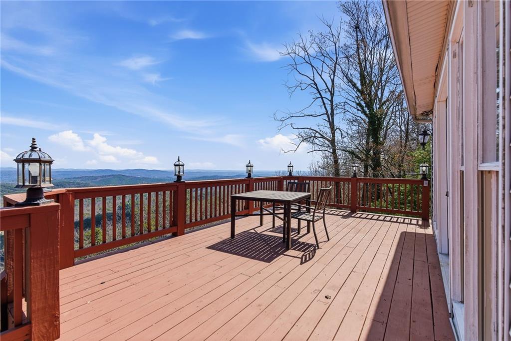 1015 Eagle Ridge Road Dawsonville, GA 30534 - Photo 29 of 64 a view of a backyard with sitting area